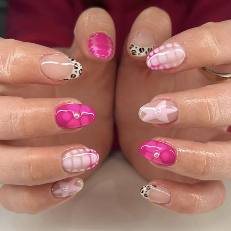 Artificial nail art with playful dots and bows Stornfield