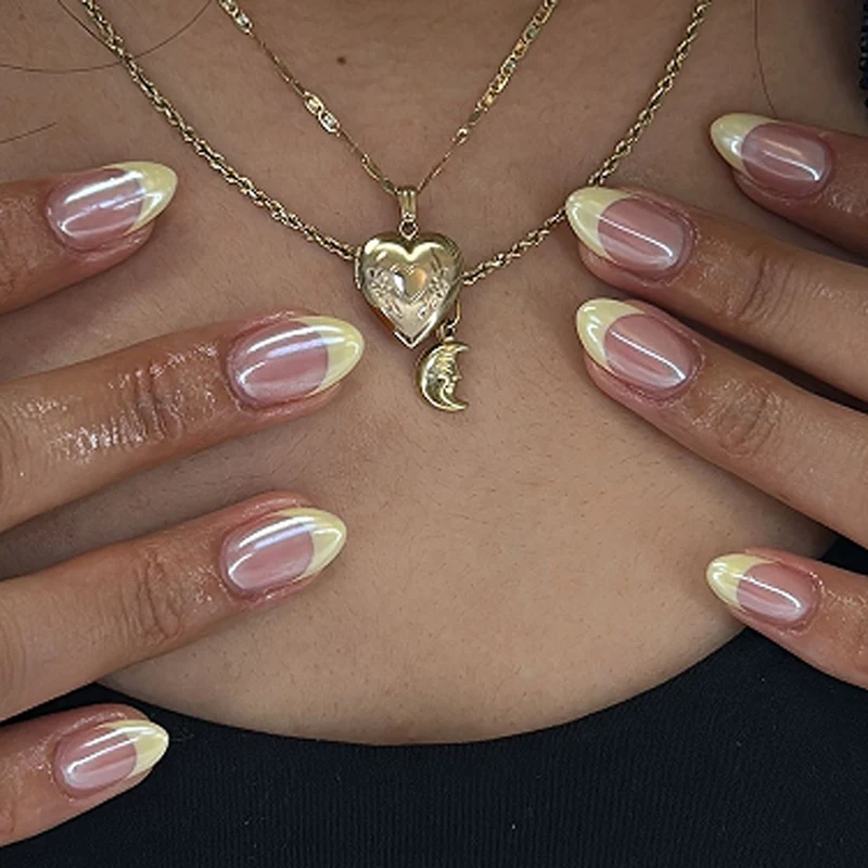 Artificial nail art with playful dots and bows Stornfield