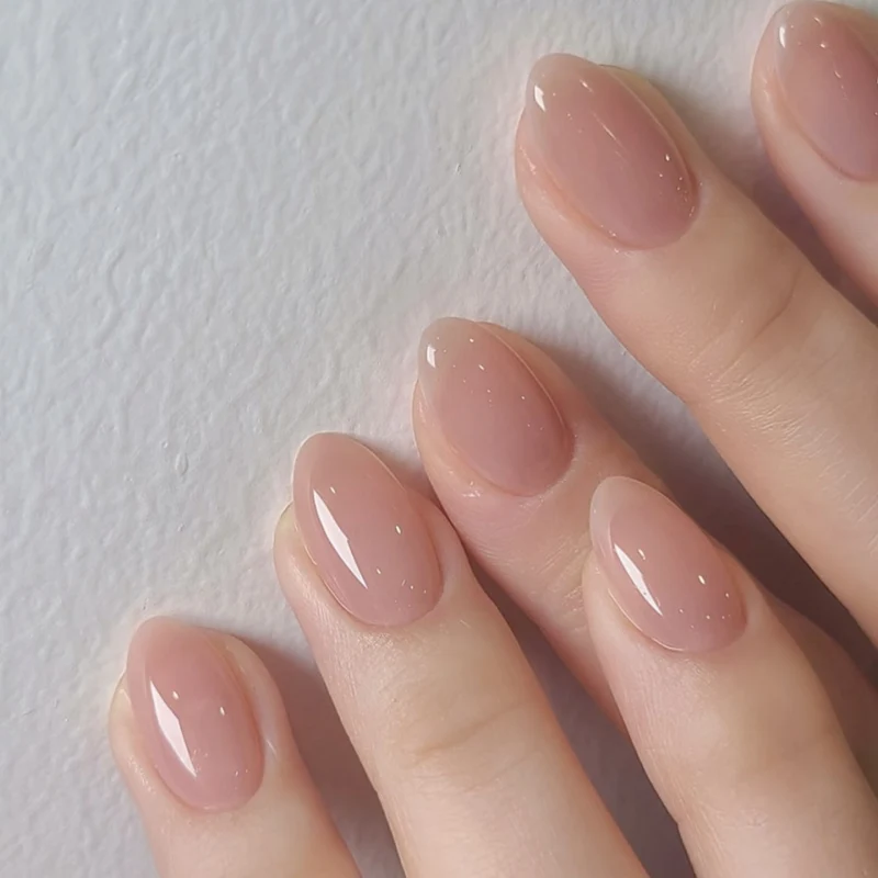 Artificial nail art with playful dots and bows Stornfield