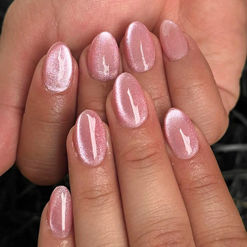 Artificial nail art with playful dots and bows Stornfield