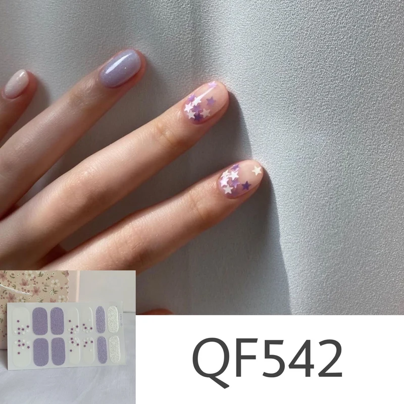 Artificial nail art with star design Stornfield
