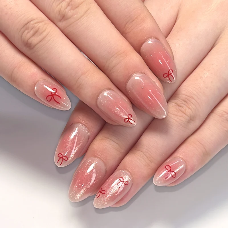 Artificial Nail Art with Bow Motif Stornfield