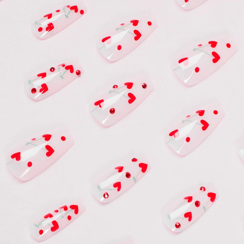 Artificial nail art with romantic heart design Stornfield