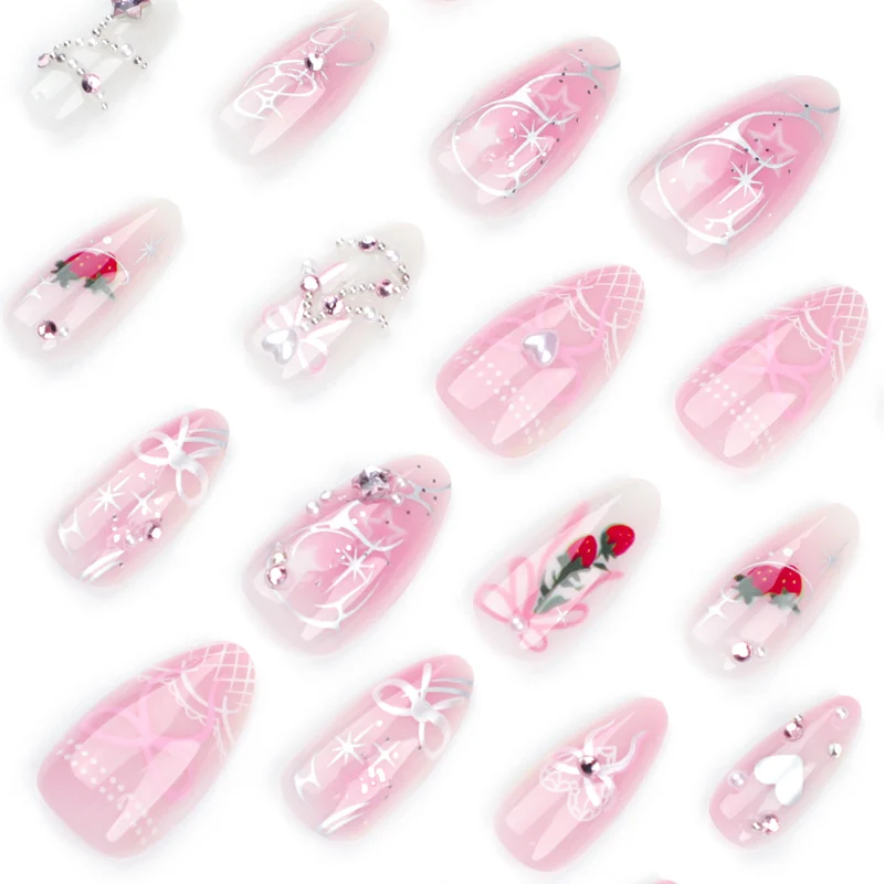 Artificial nail art with romantic design and glitter accents Stornfield