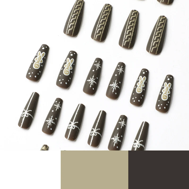 Artificial nail art with festive gingerbread design Stornfield