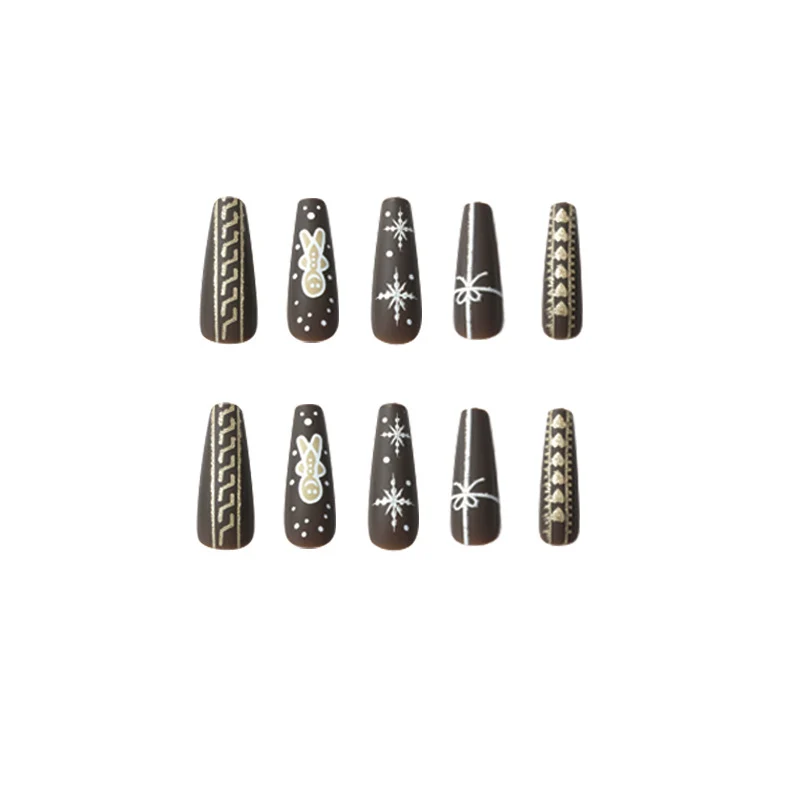 Artificial nail art with festive gingerbread design Stornfield