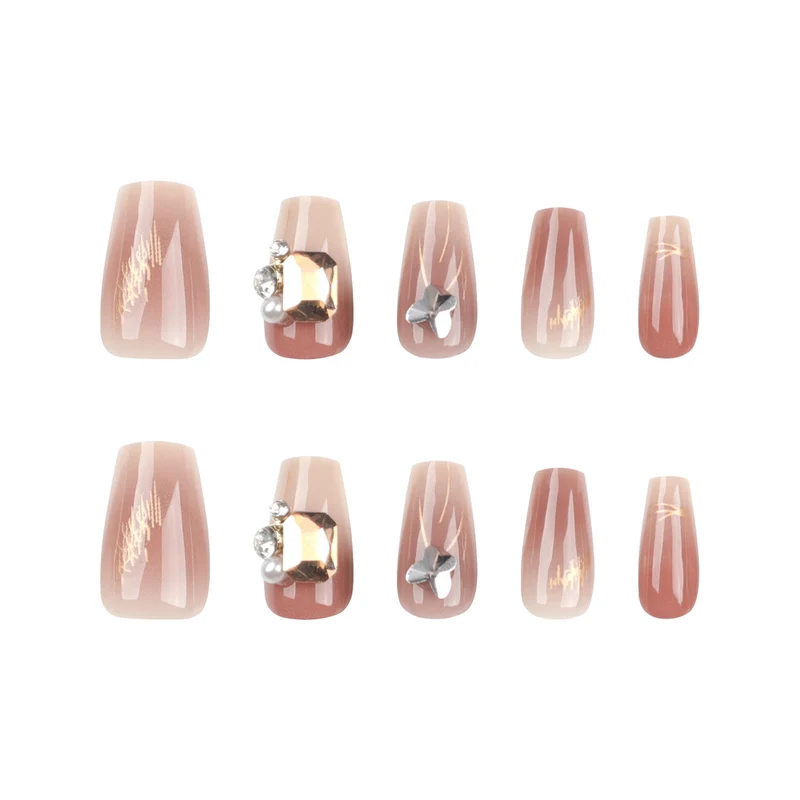 Artificial nail art with elegant jewelry accents Stornfield