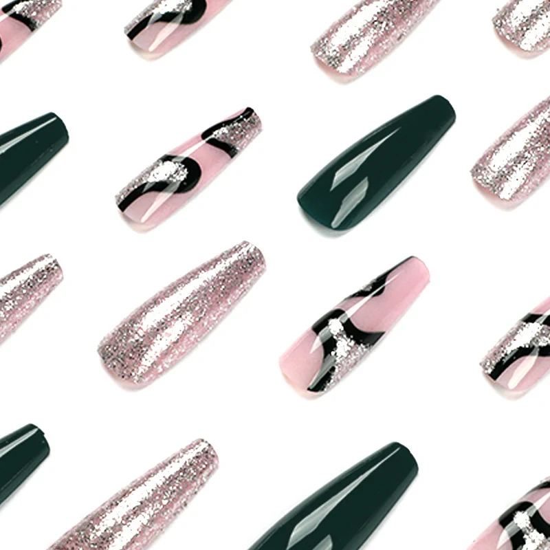 Artificial nail art with elegant glitter and gradient effects Stornfield