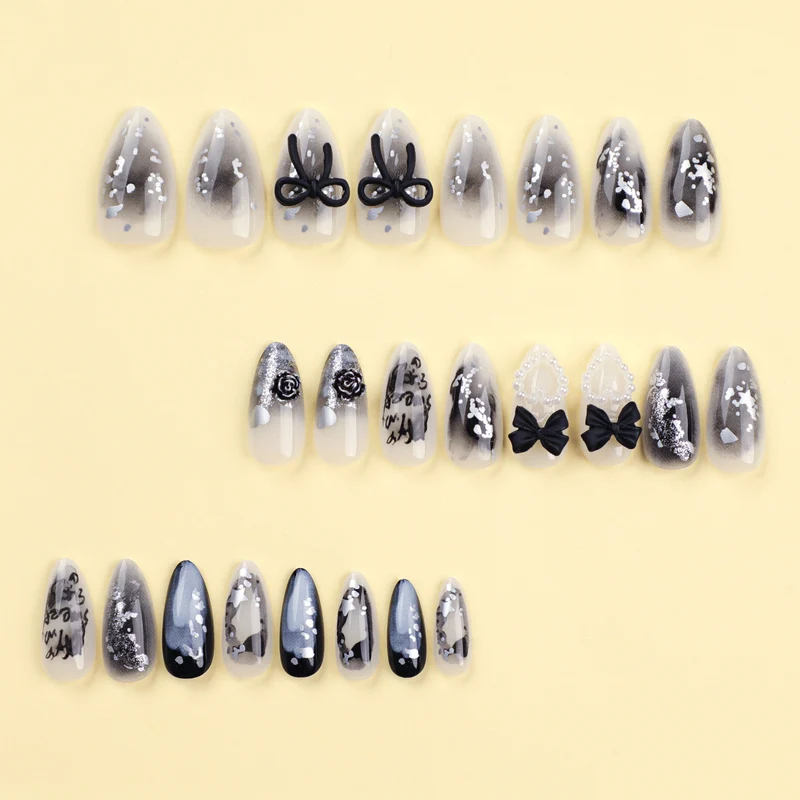 Artificial nail art with unique black and white design Stornfield
