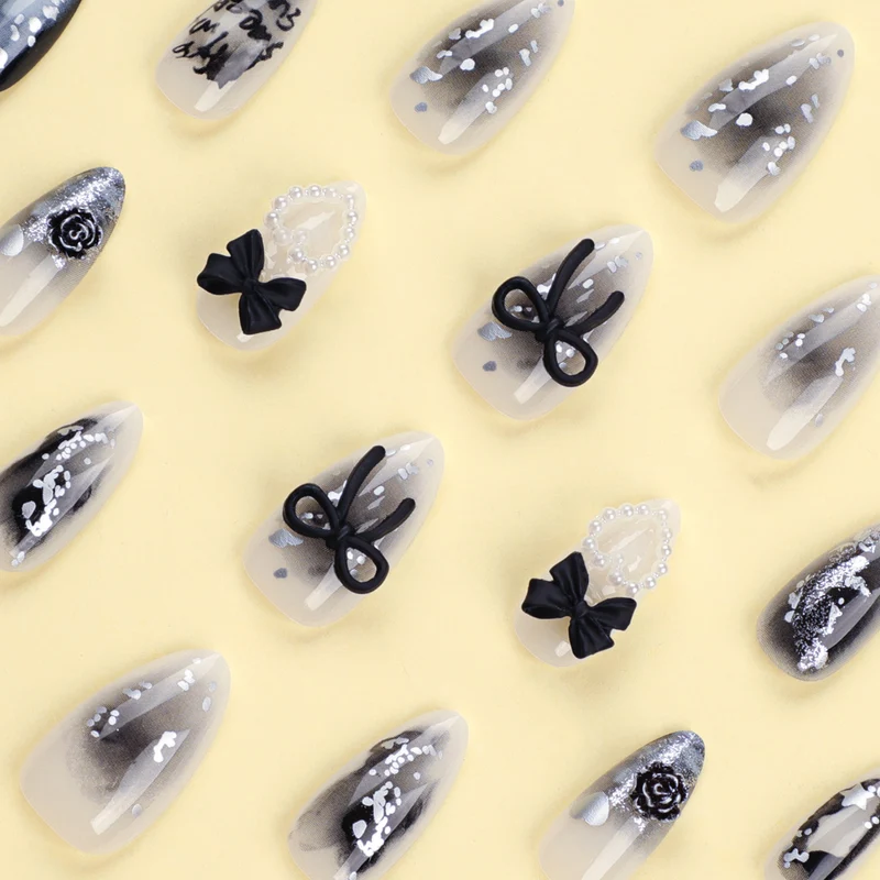 Artificial nail art with unique black and white design Stornfield