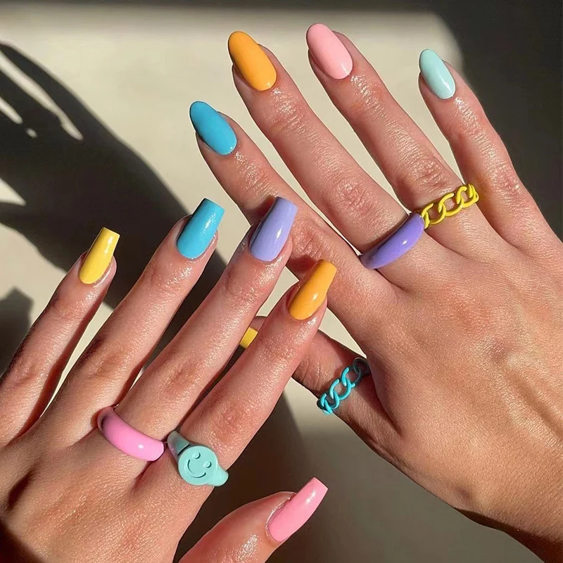 Artificial nail art with colorful designs Stornfield