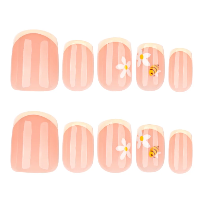 Artificial nail art with flower and bee motifs Stornfield