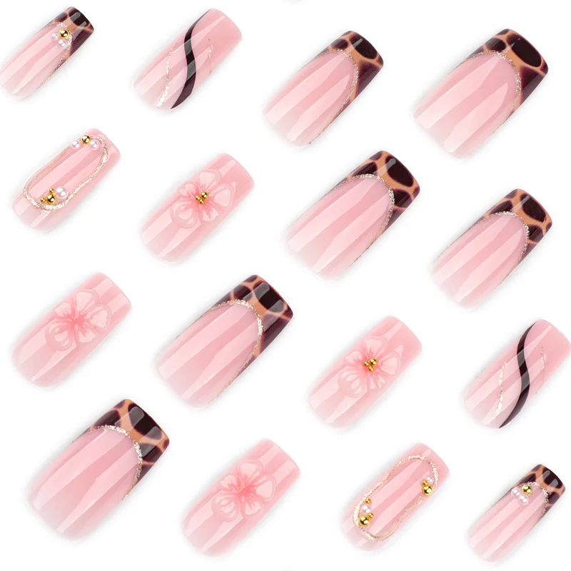 Artificial nail art with flower and glitter effects Stornfield