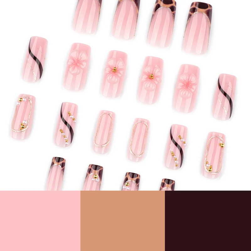 Artificial nail art with flower and glitter effects Stornfield