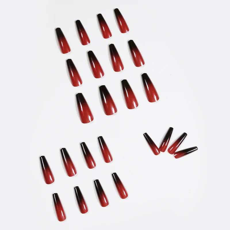 Artificial nail art in elegant stiletto design with glossy gradient colors Stornfield