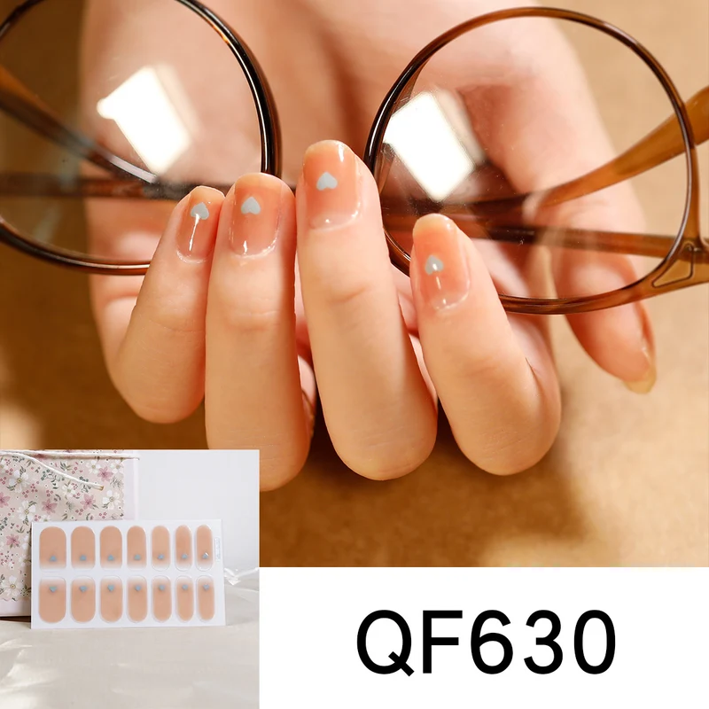 Artificial nail design with heart motif Stornfield