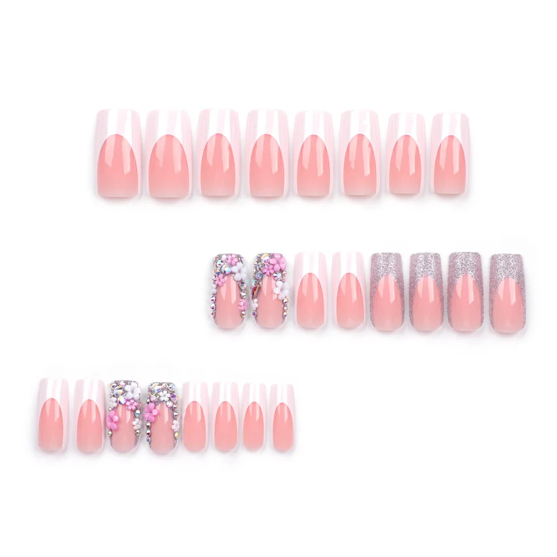 Artificial nails with floral decorations and glitter effects Stornfield