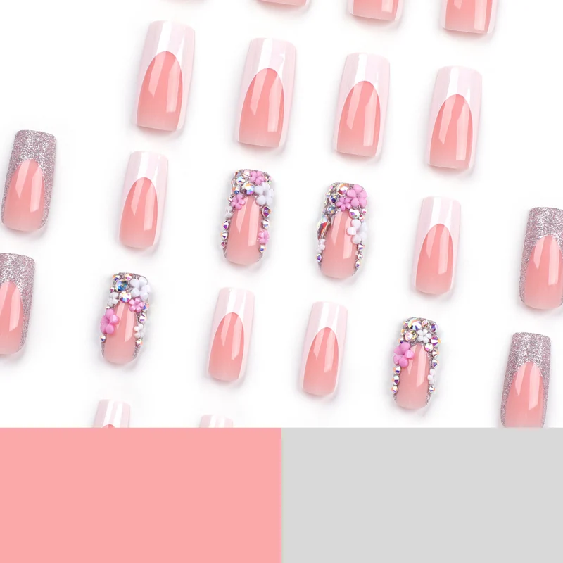 Artificial nails with floral decorations and glitter effects Stornfield