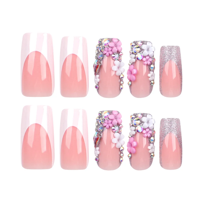 Artificial nails with floral decorations and glitter effects Stornfield