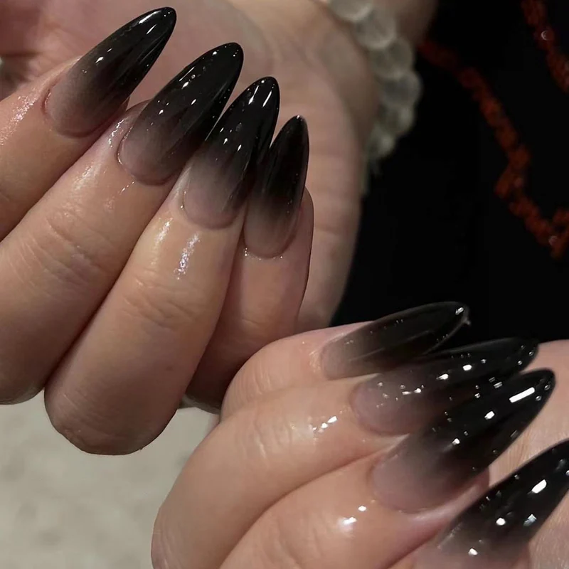 Creative Stiletto Nail Art with Blood Red Accents Stornfield