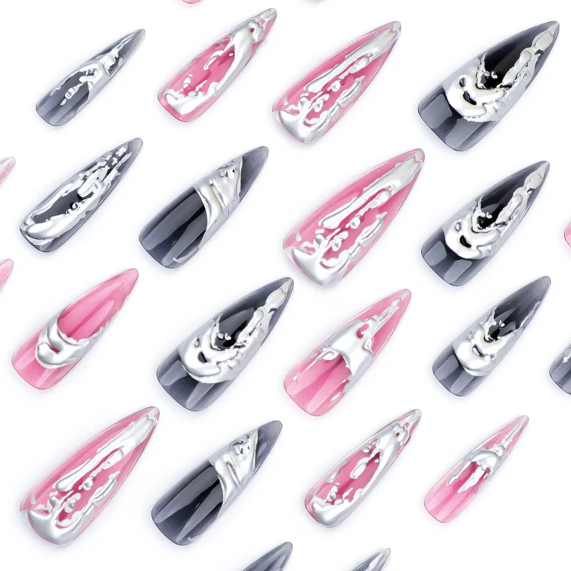 Creative stiletto nails with unique metallic details Stornfield