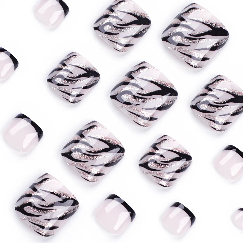 Artificial toenail art in elegant black and white design Stornfield