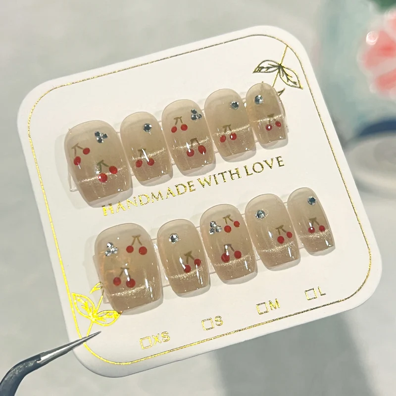 Artificial nails with cherry motif Stornfield