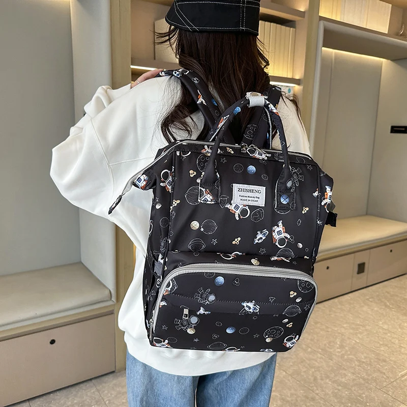 Cosmic-Themed Multi-Functional Diaper Backpack Stornfield