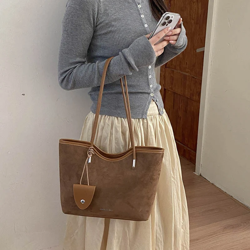 Chic Suede Tote with Decorative Pocket