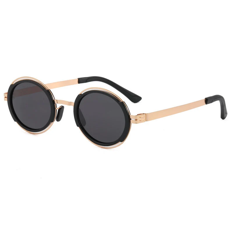 Damer moteriktig rund solbrille med elegant metallramme Luvikno