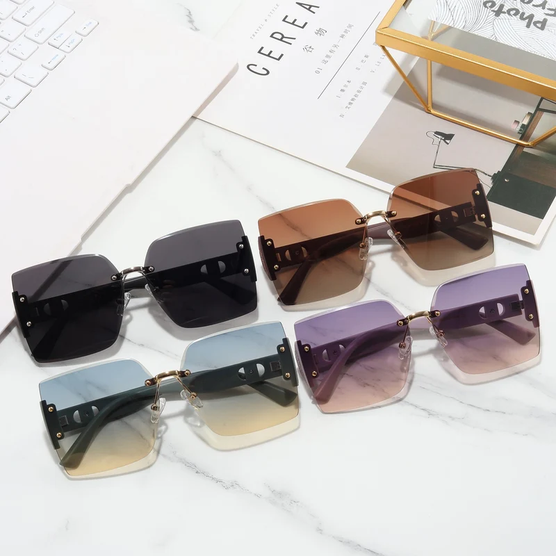Damer Høyverdig rektangulær solbrille med stilfull metallramme Luvikno