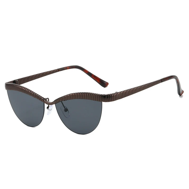 Dame Designer solbrille med unikt, bølget ramme Luvikno