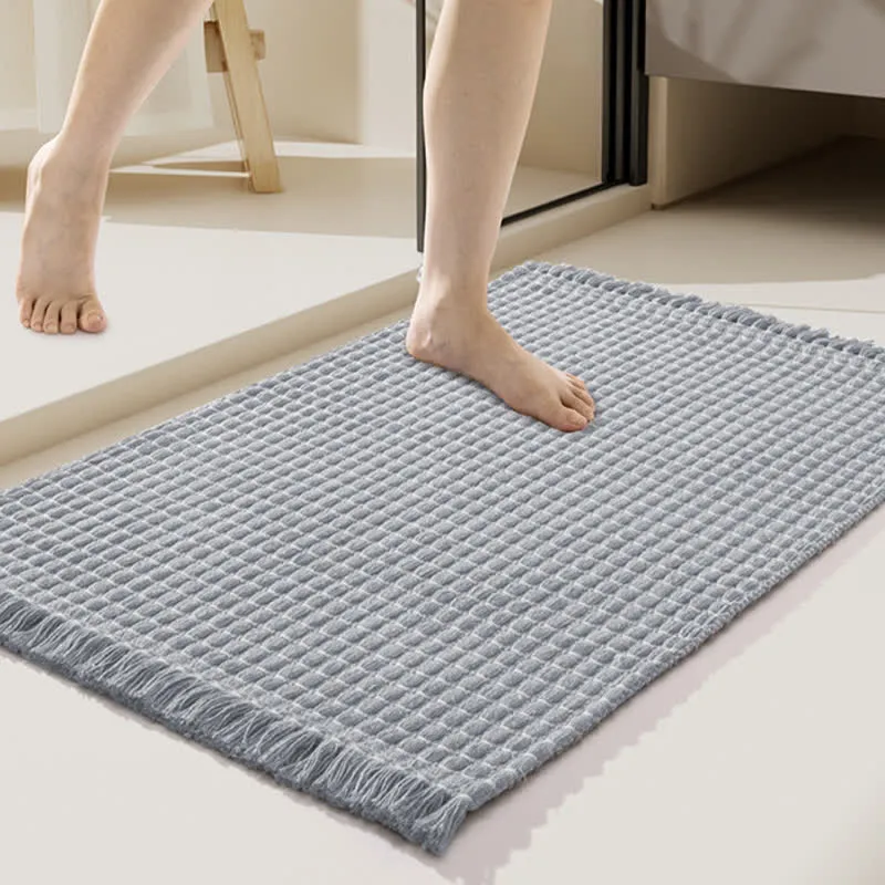 Gewebte Badematte mit Quasten