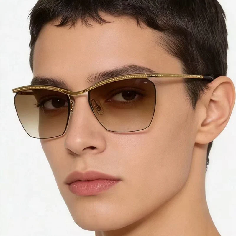 Dame moterik solbrille med filigran ramme og myk fargegradient Luvikno