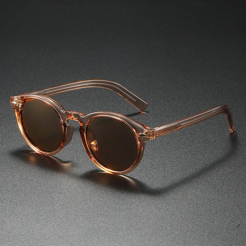 Dame Rund-solbrille med transparent ramme og reflekterende glass Luvikno