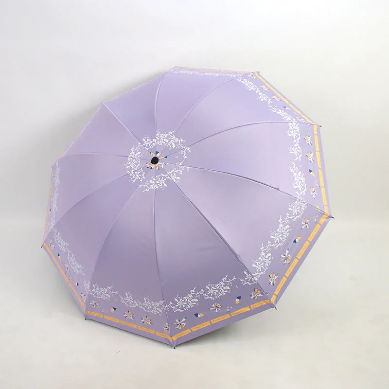 Kvinnens elegante sammenleggbare paraply med blomsterdesign Luvikno