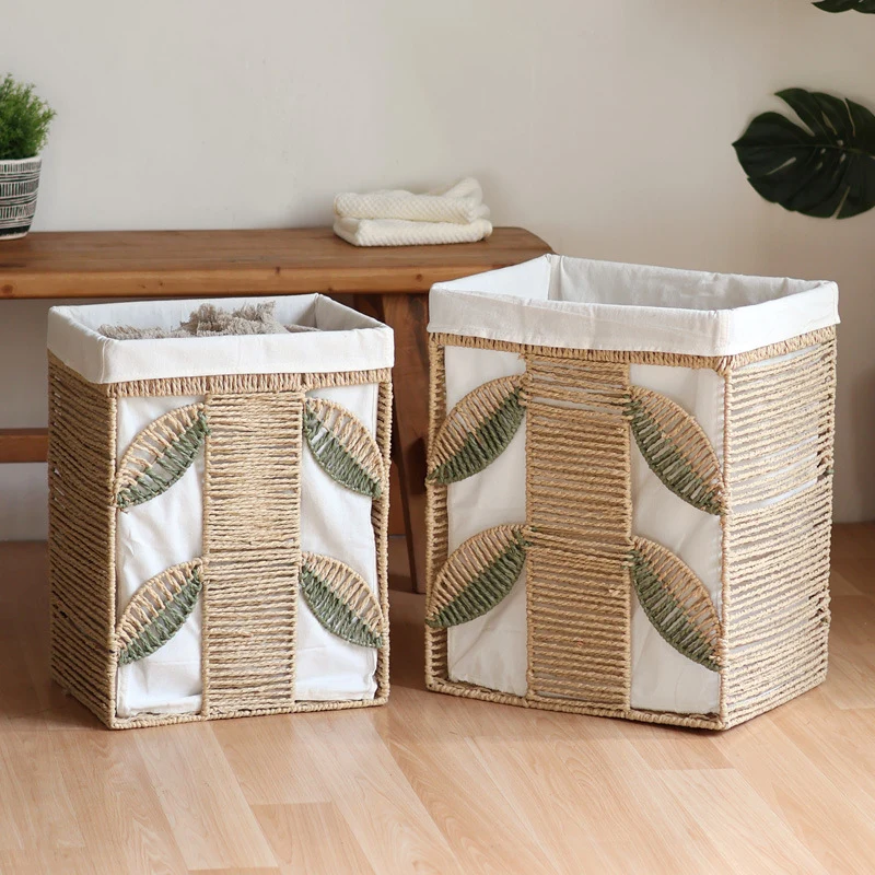 Elegant laundry basket made of natural wicker with fabric lining Stornfield