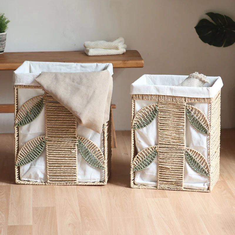 Elegant laundry basket made of natural wicker with fabric lining Stornfield