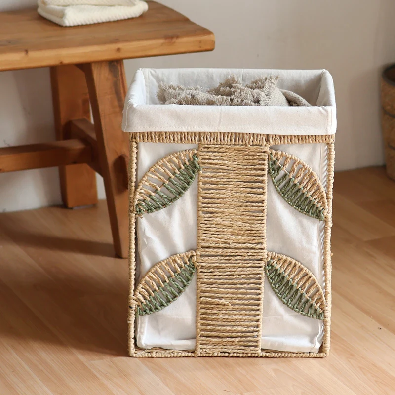 Elegant laundry basket made of natural wicker with fabric lining Stornfield