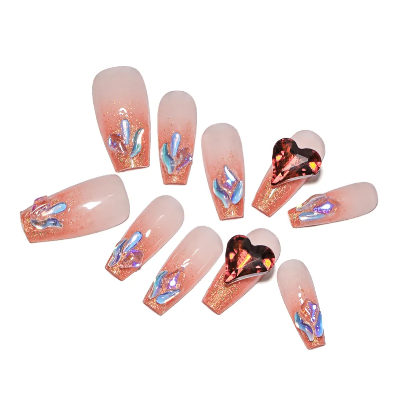Artistic acrylic nails with heart design and sparkling accents Stornfield