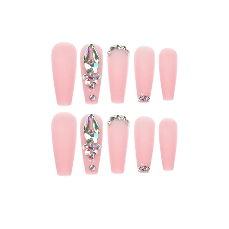 Artistic acrylic nails with glitter and rhinestone embellishments Stornfield