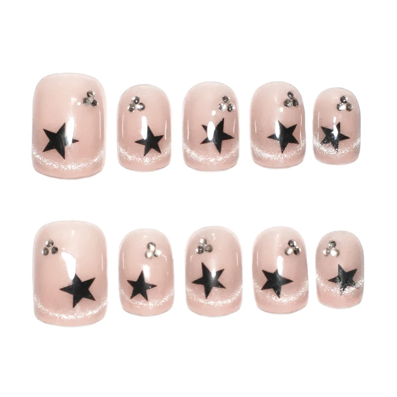 Artistic acrylic nails with glamorous star motifs Stornfield