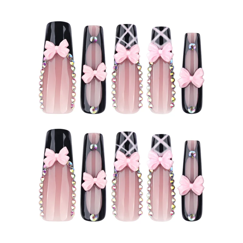 Artistic acrylic nails with floral design and rhinestone bow Stornfield