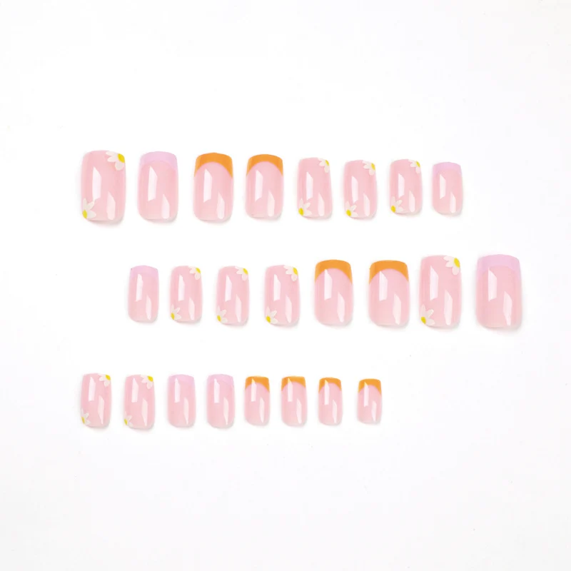 Artistic acrylic nails with floral design and creative color accents Stornfield