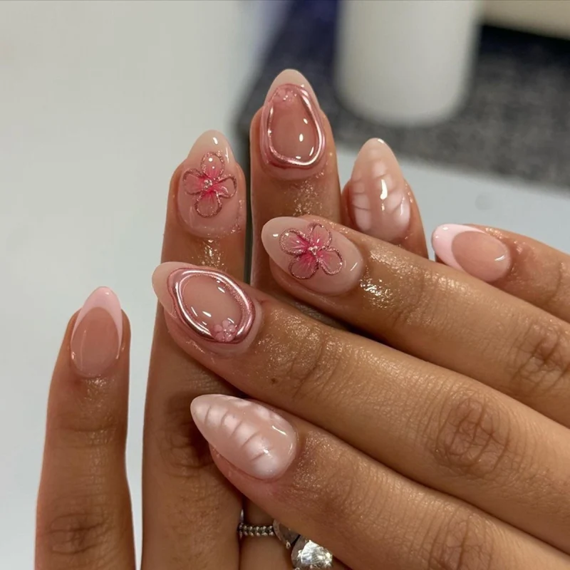 Artistic acrylic nails with floral design Stornfield