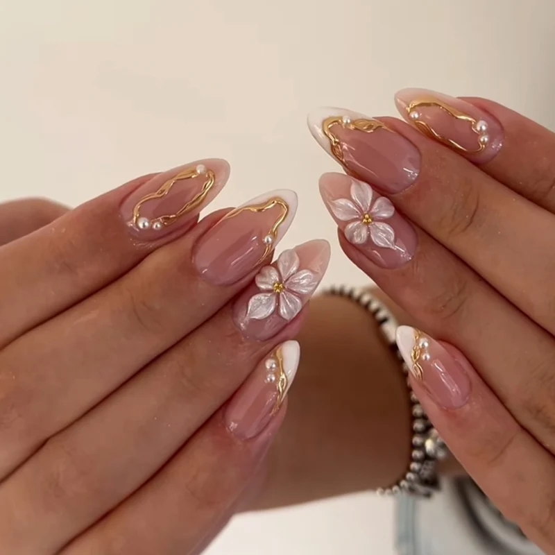 Artful acrylic nails with elegant floral accents Stornfield