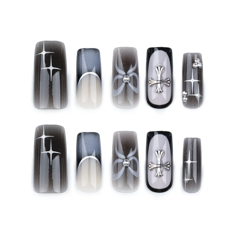 Artful acrylic nails with unique jewelry embellishments Stornfield
