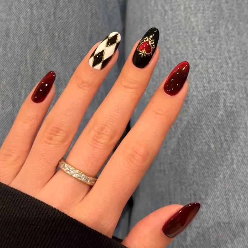 Decorative Press-On Nail Art with Unique Character Designs Stornfield