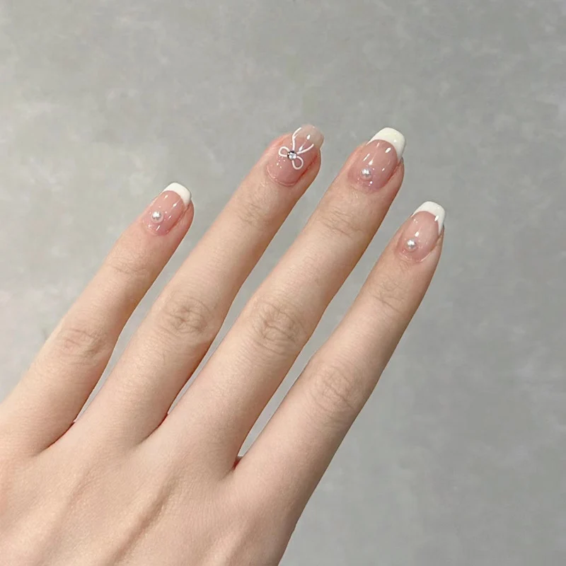 Decorative French Tip Press-On Nail Set with Bow Accents Stornfield