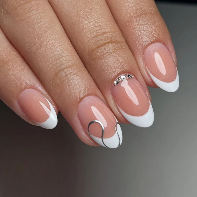 Elegant French Tip Press-On Nail Set with Decorative Accents Stornfield